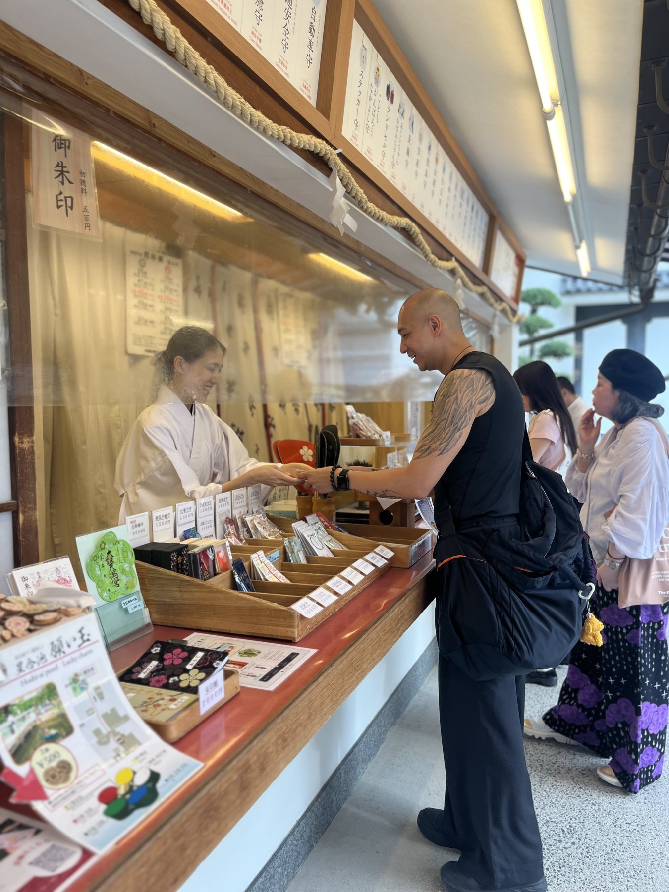 Receiving a shrine stamp in Osaka