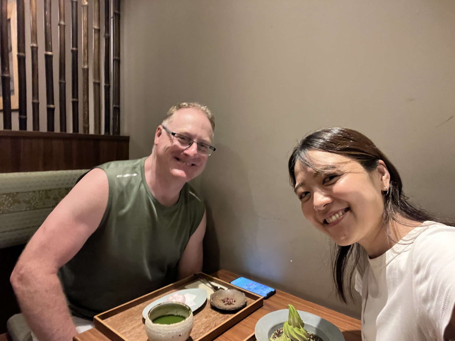 Aki sharing matcha and dessert with a private tour guest in Osaka