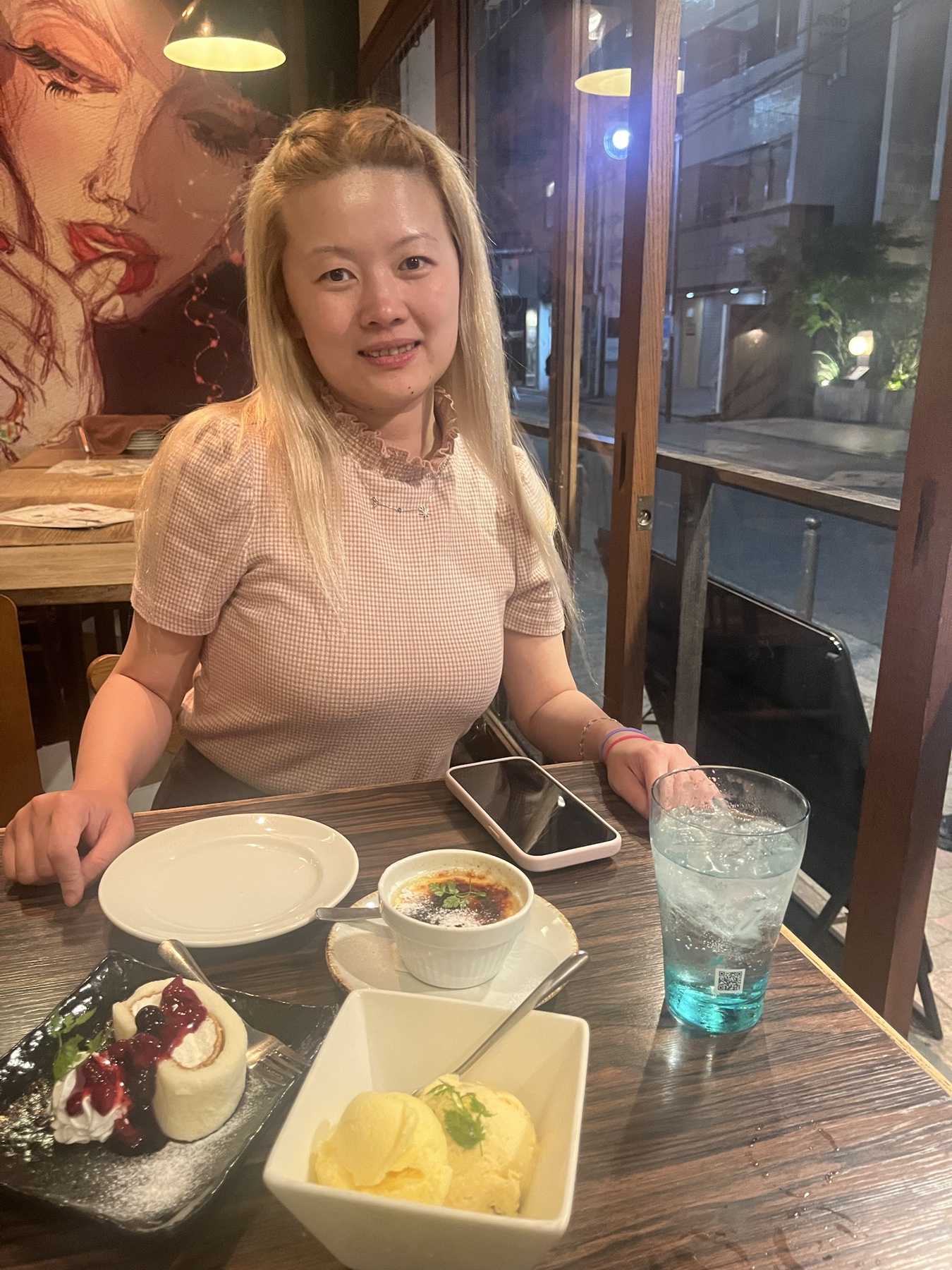 A private tour guest enjoying dessert and drinks in Osaka